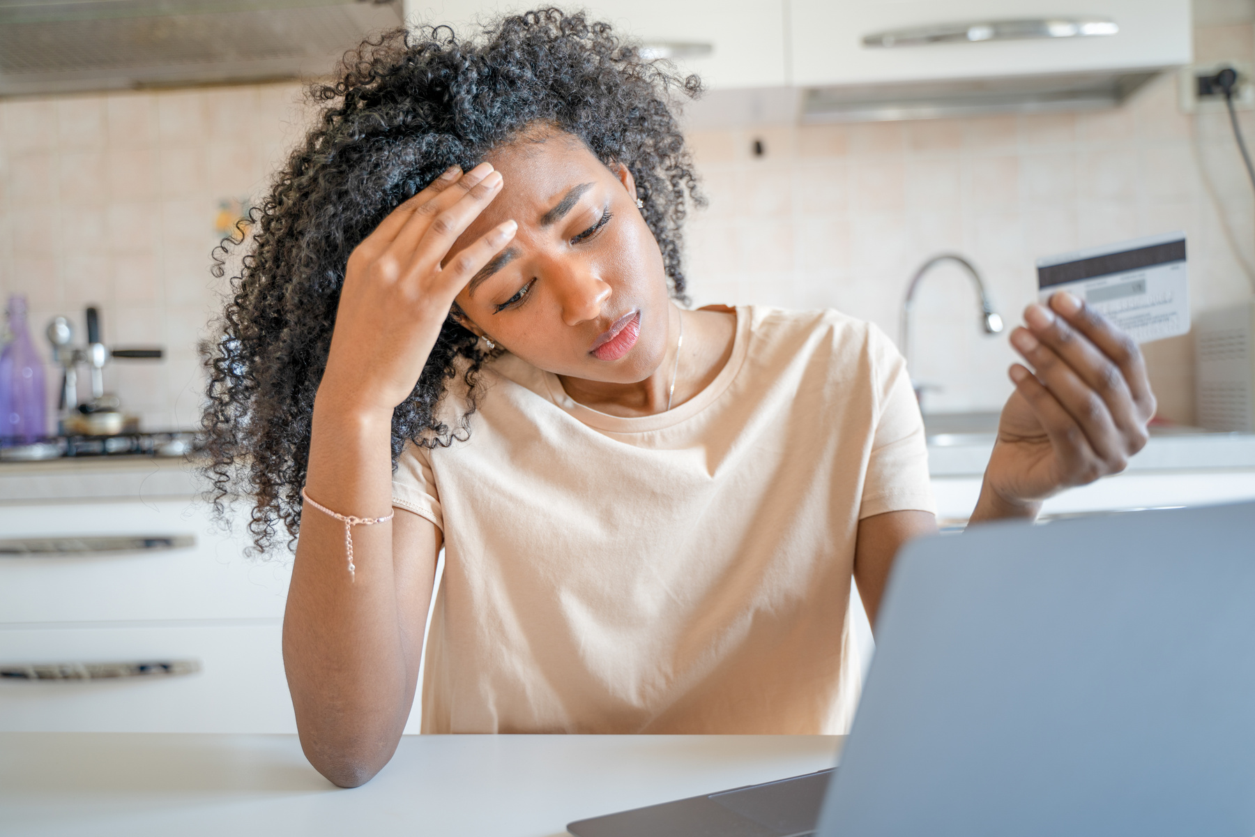 One sad black woman with credit card debt problem